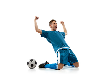 Image showing Funny emotions of professional soccer player isolated on white studio background, excitement in game