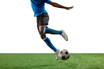 Image showing Close up legs of professional soccer, football player fighting for ball on field isolated on white background