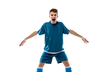 Image showing Funny emotions of professional soccer player isolated on white studio background, excitement in game