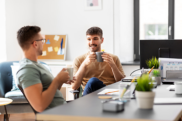 Image showing men or startuppers drinking coffee at office