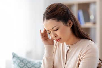 Image showing sick asian woman having headache at home