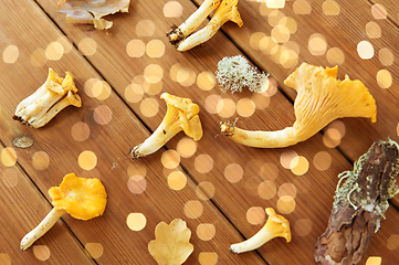 Image showing chanterelles on wooden background