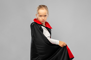 Image showing girl in costume of dracula with cape on halloween