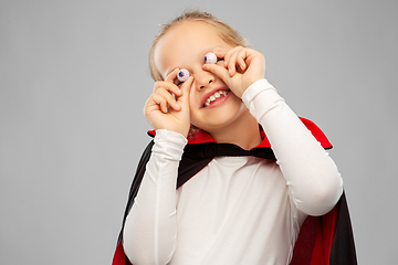 Image showing girl in halloween costume of dracula with eyeballs