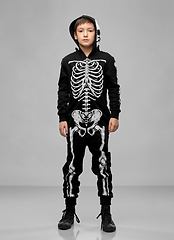 Image showing boy in black halloween costume with skeleton bones