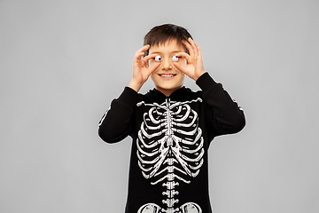 Image showing boy in halloween costume of skeleton with eyeballs