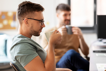 Image showing men or startuppers drinking coffee at office