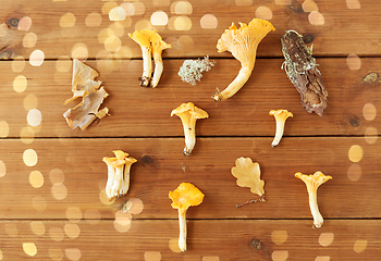 Image showing chanterelles on wooden background