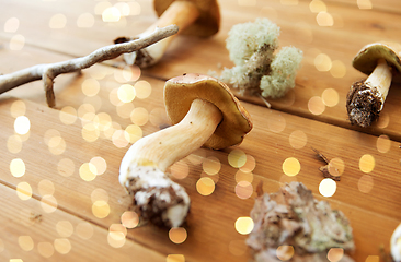 Image showing boletus edulis mushrooms on wooden background