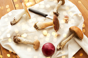 Image showing edible mushrooms, kitchen knife and towel