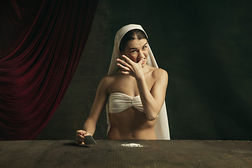 Image showing Modern remake of classical artwork with coronavirus theme - young medieval woman on dark background