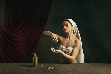 Image showing Modern remake of classical artwork with coronavirus theme - young medieval woman on dark background