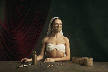 Image showing Modern remake of classical artwork with coronavirus theme - young medieval woman on dark background