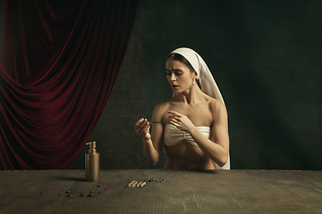 Image showing Modern remake of classical artwork with coronavirus theme - young medieval woman on dark background