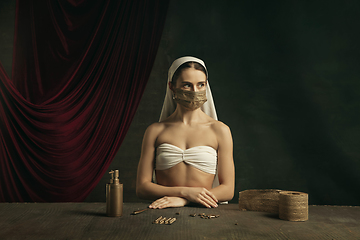 Image showing Modern remake of classical artwork with coronavirus theme - young medieval woman on dark background