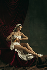 Image showing Modern remake of classical artwork with coronavirus theme - young medieval woman on dark background