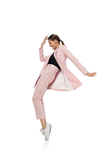 Image showing Happy young woman dancing in stylish clothes or suit, remaking legendary moves of celebrity from culture history