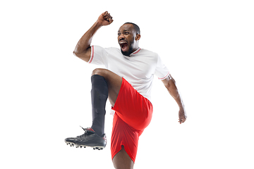 Image showing Funny emotions of professional football, soccer player isolated on white studio background, excitement in game