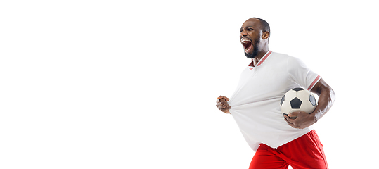 Image showing Funny emotions of professional football, soccer player isolated on white studio background, excitement in game