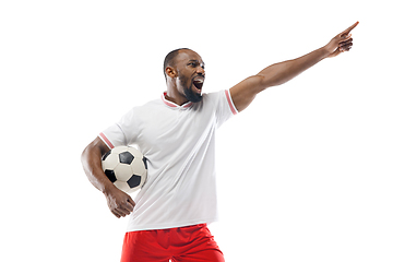 Image showing Funny emotions of professional football, soccer player isolated on white studio background, excitement in game