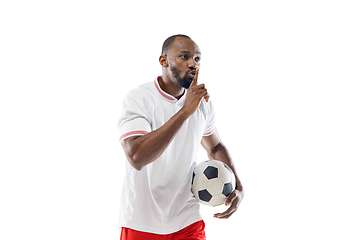 Image showing Funny emotions of professional football, soccer player isolated on white studio background, excitement in game