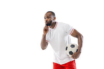 Image showing Funny emotions of professional football, soccer player isolated on white studio background, excitement in game