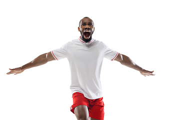 Image showing Funny emotions of professional football, soccer player isolated on white studio background, excitement in game