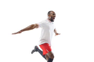 Image showing Funny emotions of professional football, soccer player isolated on white studio background, excitement in game