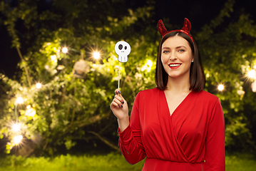 Image showing happy woman in red halloween costume of devil