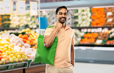 Image showing man with reusable canvas bag for food shopping