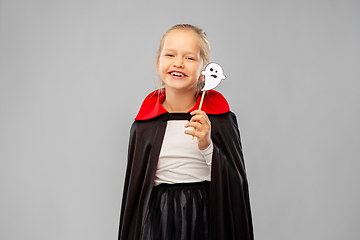 Image showing girl in costume of dracula with cape on halloween