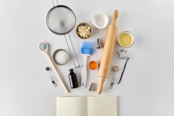 Image showing recipe book and cooking ingredients on table