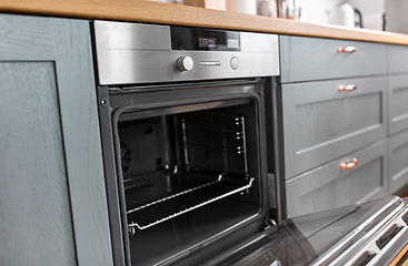 Image showing open oven at home kitchen