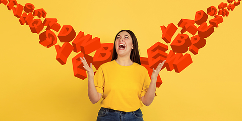 Image showing Woman shouting, screaming on studio background. Sales, offer, business, cheering fun concept.