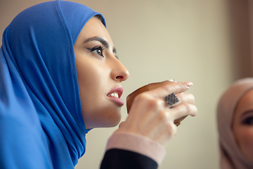 Image showing Beautiful arab women meeting at cafe or restaurant, friends or business meeting