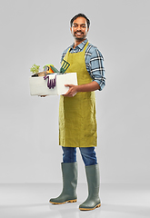 Image showing indian gardener or farmer with box of garden tools