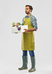Image showing indian gardener or farmer with box of garden tools