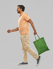 Image showing man with reusable canvas bag for food shopping