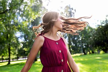 Image showing portrait of happy smiling woman at summer park