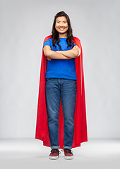 Image showing happy asian woman in red superhero cape