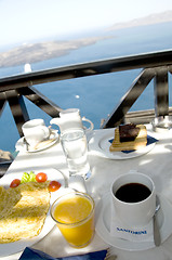 Image showing santorini breakfast over the harbor