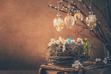 Image showing Nest with Easter eggs and blooming branches with pussy willow branches decorated