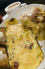 Image showing egg omelette with home fries 