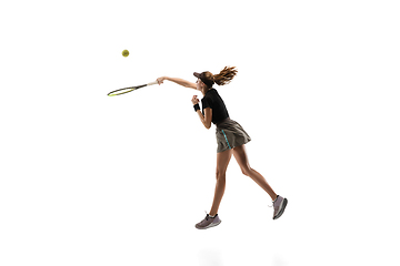 Image showing Young caucasian professional sportswoman playing tennis isolated on white background