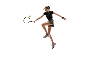 Image showing Young caucasian professional sportswoman playing tennis isolated on white background