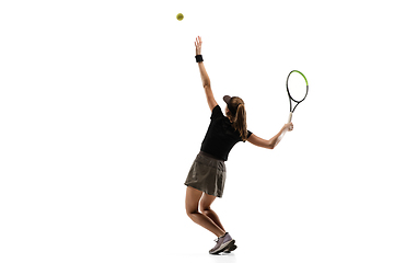 Image showing Young caucasian professional sportswoman playing tennis isolated on white background