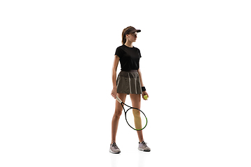 Image showing Young caucasian professional sportswoman playing tennis isolated on white background