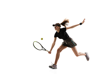 Image showing Young caucasian professional sportswoman playing tennis isolated on white background