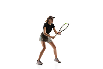 Image showing Young caucasian professional sportswoman playing tennis isolated on white background