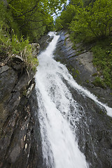 Image showing Waterfall falling from far up